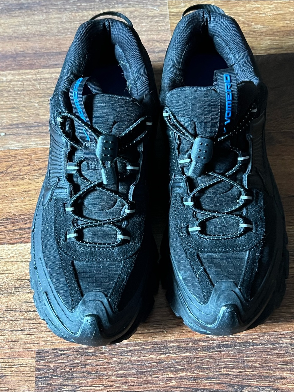 Nike Men's Black Athletic Shoes with Blue Accents